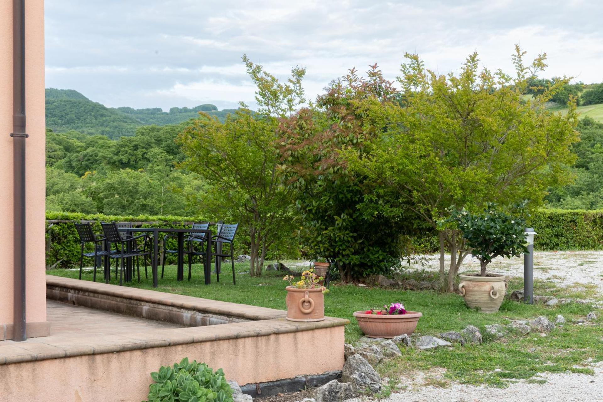 Вилла Relais Parco Del Subasio Пьяно-делле-Пьеве Экстерьер фото