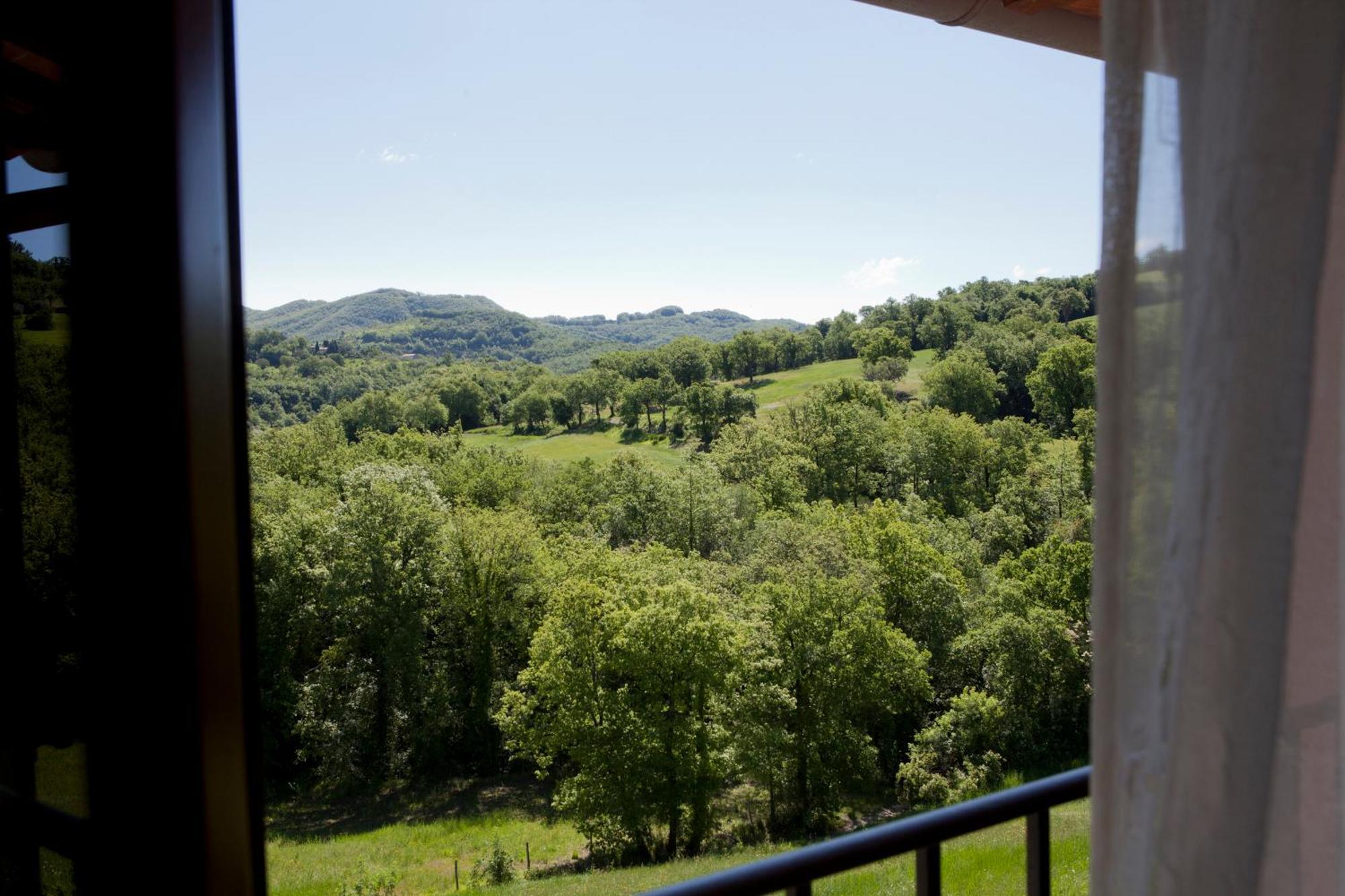 Вилла Relais Parco Del Subasio Пьяно-делле-Пьеве Экстерьер фото