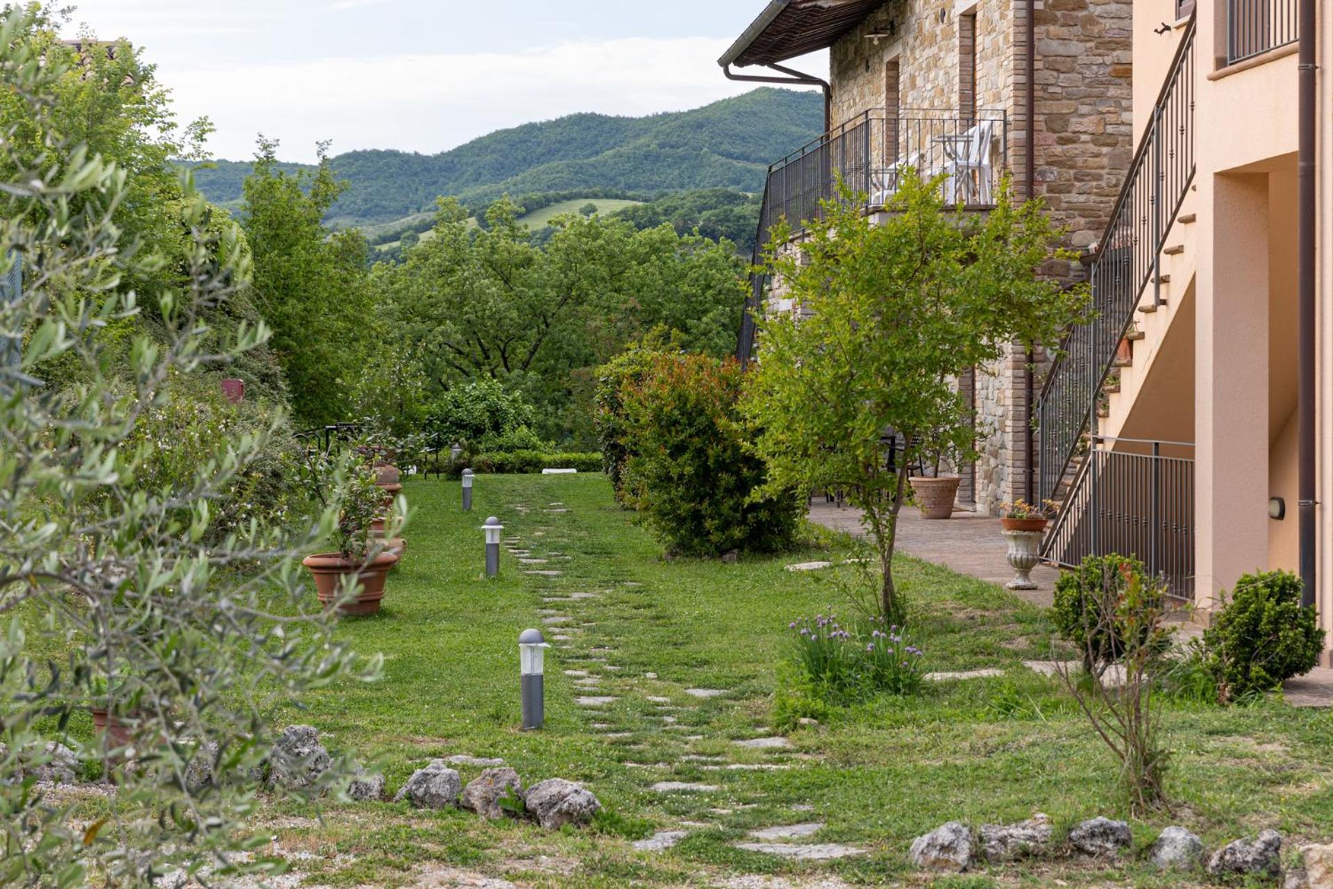 Вилла Relais Parco Del Subasio Пьяно-делле-Пьеве Экстерьер фото